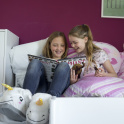 Boarders reading on a bed at St Peter's Prep, Exmouth