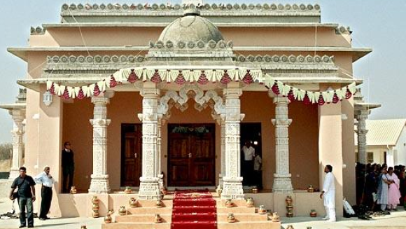 The exterior of a traditional temple in Gaborone, Botswana, with intricate architectural details.