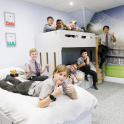 Boarders on the beds in a dorm at Aldwickbury School