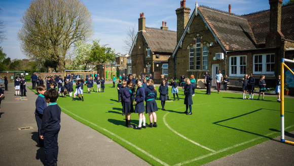 Playground and astroturf at breaktime at Dulwich Hamlet Junior School