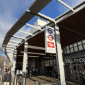 The exterior of Ealing Broadway station on a sunny day