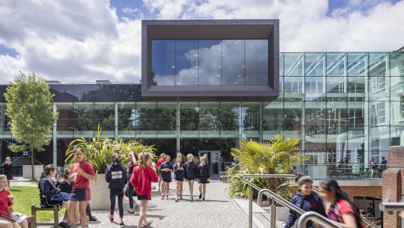 The plateglass exterior of the remodelled senior school of Notting Hill and Ealing High School for Girls