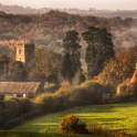 Autumnal landscape of Kent village, featuring classic Kentish Oast houses