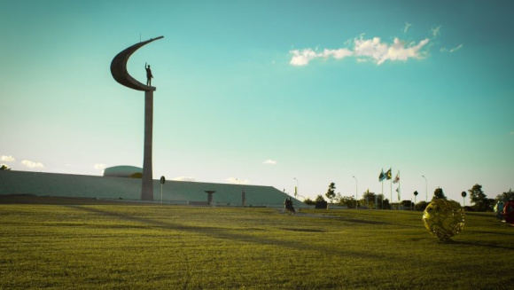 A striking architectural view of a modern building in Bras&iacute;lia, Brazil, showcasing sleek lines and contemporary design under a clear sky.