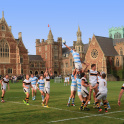 Line-out during a rugby match at Clifton College with exterior of college in background