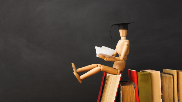 results day marionette in graduation hat