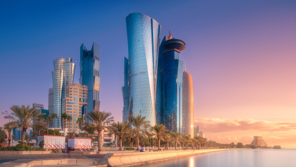 The skyline of West Bay and Doha City Center during sunrise, Qatar.