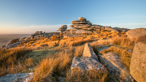 Sunrise with The Cheesering stones on Bodmin Moor, Cornwall
