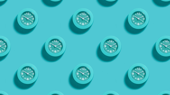 Lots of clocks on a blue background