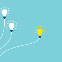 A lit lightbulb surrounded by others that have not been turned on