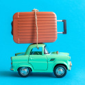 A rendered image of suitcase on car roof on blue background for a travelling to boarding school concept.