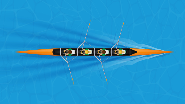 An image from above of a team rowing