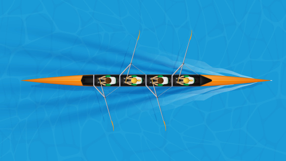An image from above of a team rowing