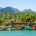 Langkawi, the Jewel of Kedah, is a district and an archipelago of 99 islands in the Andaman Sea some 30 km off the mainland coast of northwestern Malaysia
