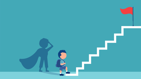 A boy going up some stairs to his goal while his shadow shows he's a superhero in a cape