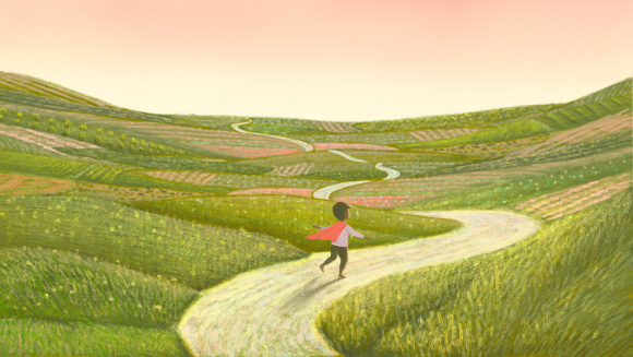 A child in a superhero cape running through fields