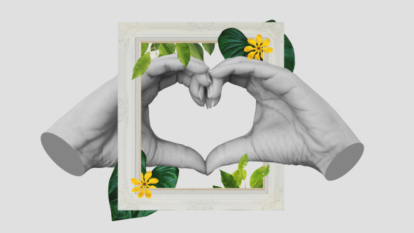 A heart made of hands in a floral frame