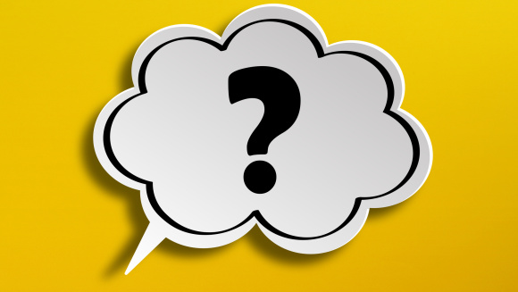 Question mark in a speech bubble on a yellow background