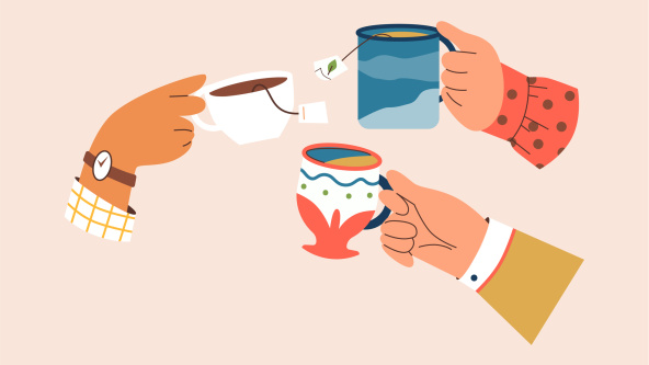 Hands holding cups of tea