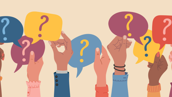 Hands holding up question marks