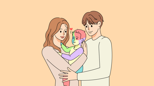 Parents hugging a small boy with autism