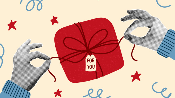 Two hands opening a present