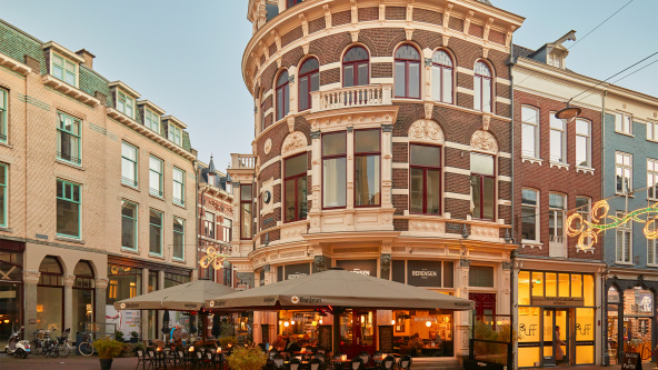 Small square with stores and bar with christmas decoration in the city center of Arnhem, The Netherlands
