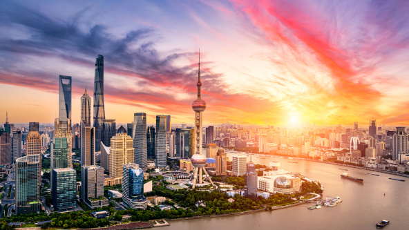 City skyscraper building complex landscape in Shanghai at sunrise