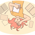 Girl student lying on the floor clutching head after experiencing burnout associated with overload