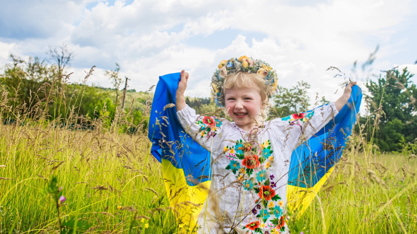 Patriotic Girl Flying Ukrainian Flag