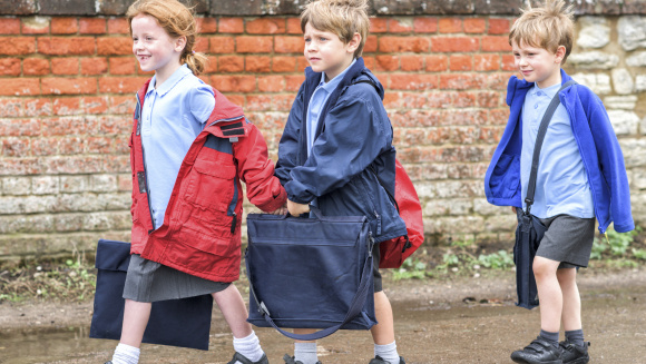 Primary school children on their way to school