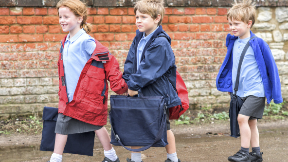 Primary school children on their way to school
