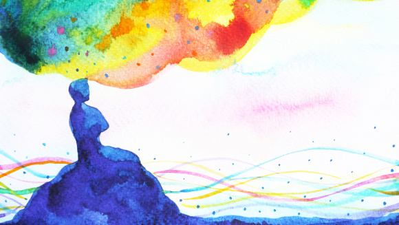 A watercolour of a child on a hill with colours representing imagination