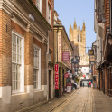 A view of Canterbury Cathedral from the narrow shopping streets of Canterbury