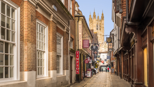 A view of Canterbury Cathedral from the narrow shopping streets of Canterbury