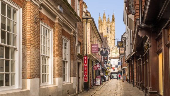 A view of Canterbury Cathedral from the narrow shopping streets of Canterbury