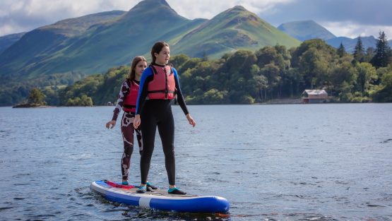 Keswick School pupils on a paddle boarding in the Lake District