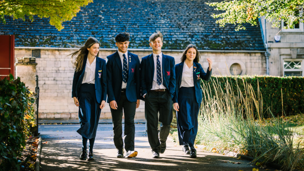 Male and female pupils at Stamford School walking together