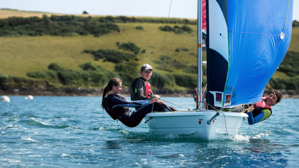 Pupils of Truro School at sea in a sailing dinghy