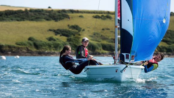 Pupils of Truro School at sea in a sailing dinghy