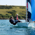 Pupils of Truro School at sea in a sailing dinghy