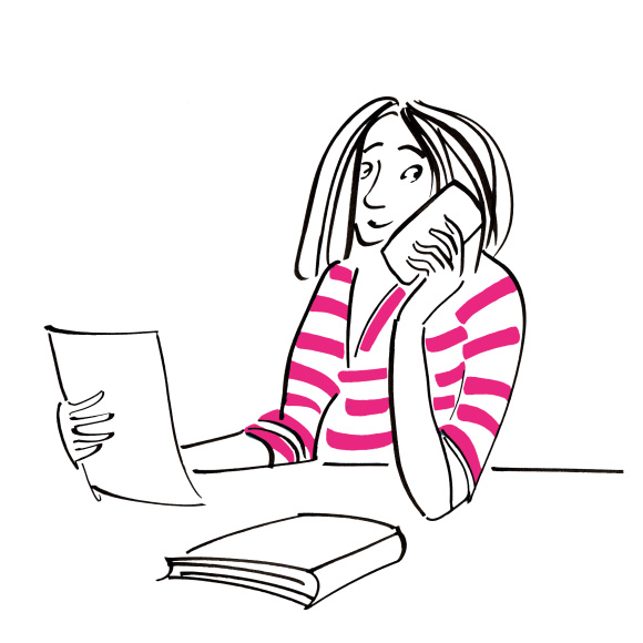 An education consultant on the phone holding a report