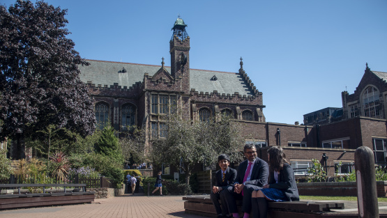 In the grounds of Bristol Grammar School with the Big School, a Victorian gothic building containing the Great Hall in the background