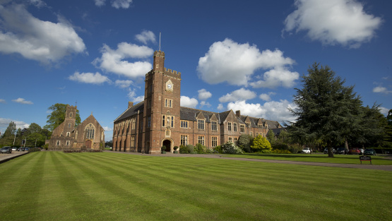 Wide angle shot showing school ground and the bell tower at Blundell's Schools