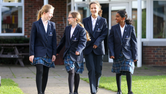 Pupils walking outside at Bournemouth School for Girls