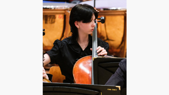 Chloe playing the cello with Loughborough Schools Foundation Symphony Orchestra