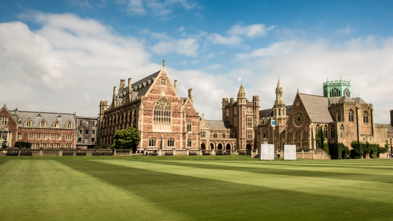 Wide angle shot of Clifton College, showing main buildings and cricket pitch in the foreground