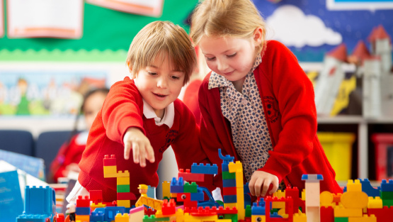 Two children play with duplo at St Edmund's School Nursery, Canterbury