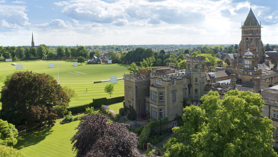 And aerial view of Rugby School taking in school buildings and cricket pitch