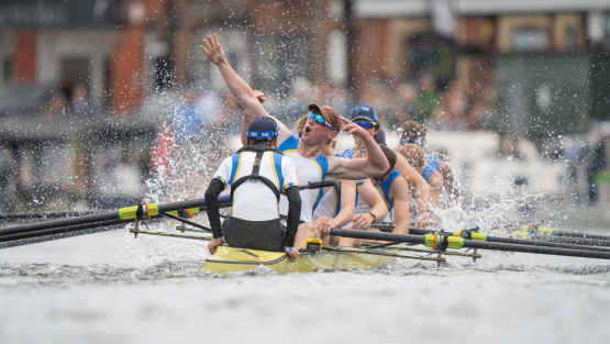 St Edward's Oxford boys' eight rowers celebrate at the end of a race